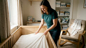 Parent preparing eco-friendly baby nursery