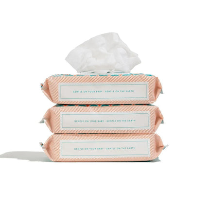 Stack of three Joonya Natural Baby Wipes packs, fragrance-free, with aloe vera, chamomile, and jojoba oil for sensitive skin.
